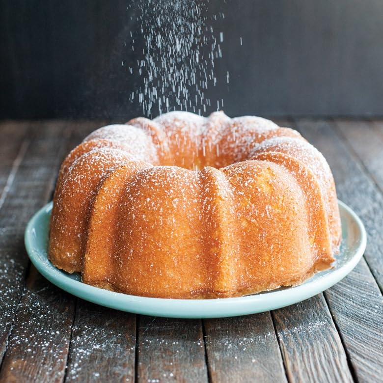 Nordic Ware Twilight Blue Bundt pan, 6-cup capacity, ideal for mini cakes.