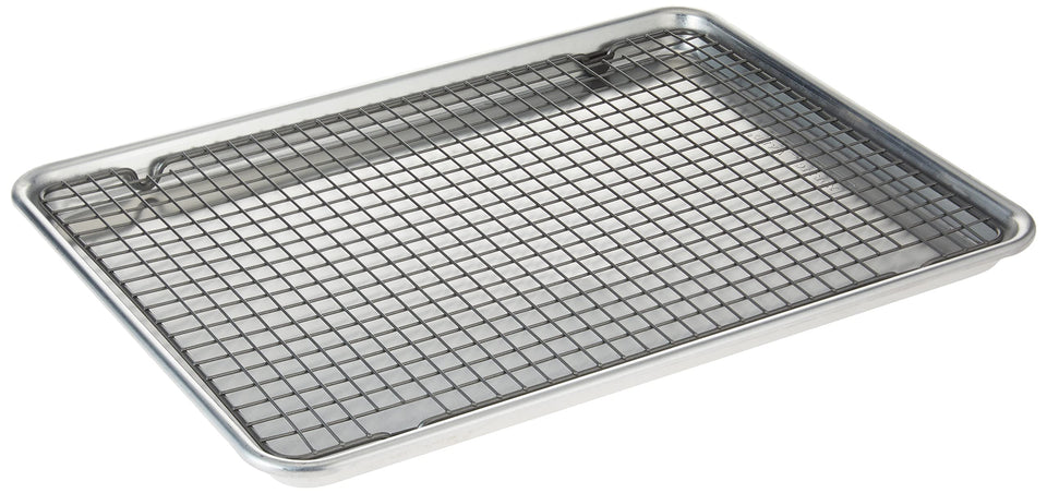 Nordic Ware half sheet pan for even browning and spacious baking surface.
