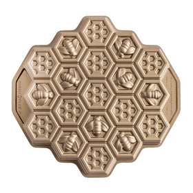 Nordic Ware honeycomb pull-apart pan for precise cakelet shapes and easy release.