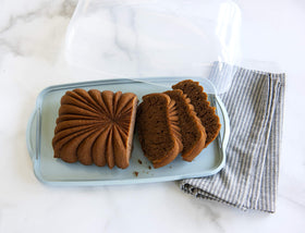 Nordic Ware loaf pans fit, designed to accommodate standard quick bread pans.