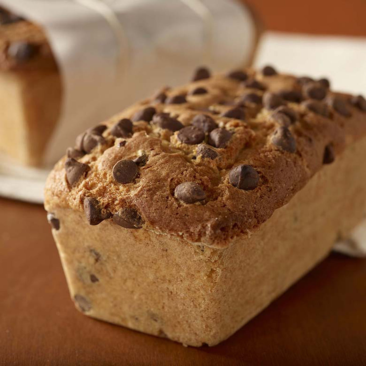 Nordic Ware mini loaf pans with reinforced steel rims prevent warping during baking.