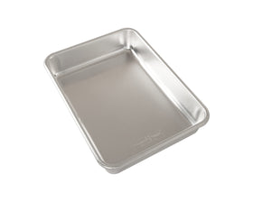 Nordic Ware Natural Aluminum Rectangular Cake Pan, top view, durable for lifetime baking use.