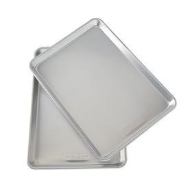 Nordic Ware Naturals aluminum bakeware on counter with ingredients suggests everyday meal prep
