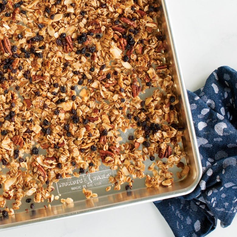 Nordic Ware Naturals half-sheet pan durability emphasized by sturdy construction in use