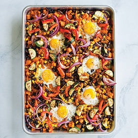Nordic Ware Naturals half sheet pan with generous edge for easy handling and transfer.