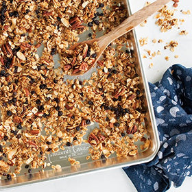 Nordic Ware Naturals half sheet pan in oven use delivers even browning.