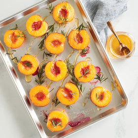 Nordic Ware Naturals half sheet pan inside view highlights even heat distribution for baking.