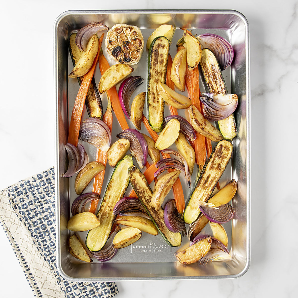 Nordic Ware Naturals high-sided pan 2-inch sides suit brownies and bars.