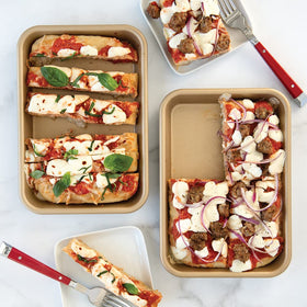 Nordic Ware Naturals nonstick eighth sheet inside view, smooth surface ideal for breading prep.