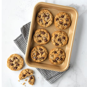 Nordic Ware Naturals nonstick eighth sheet two-pack, compact storage friendly.