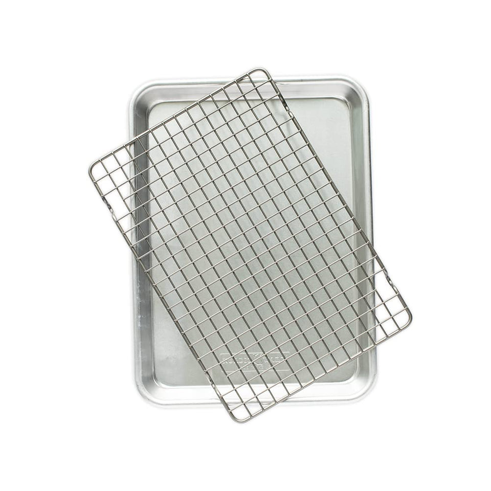 Nordic Ware Naturals quarter sheet outer view; compact for singles.