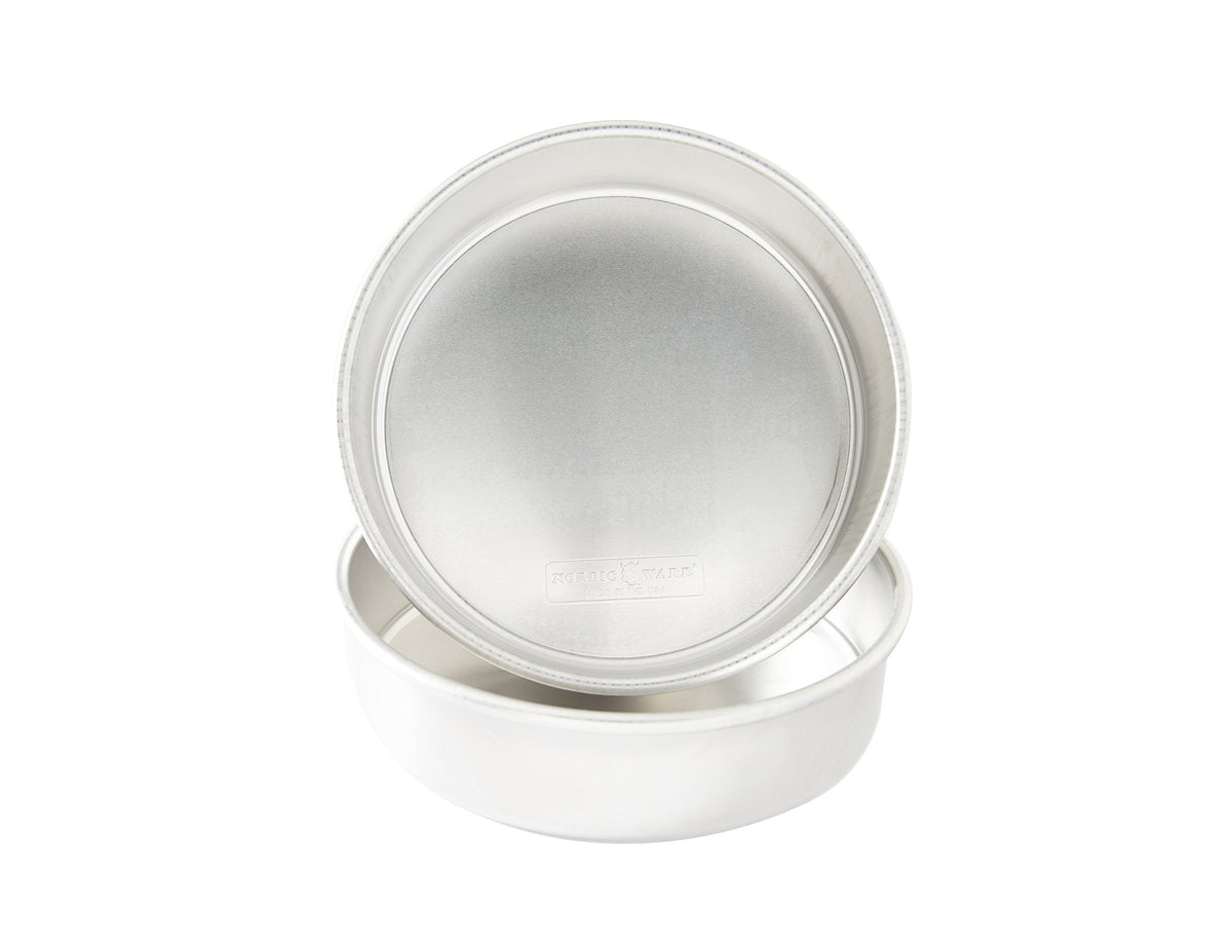 Nordic Ware Naturals 9-inch round cake pan set for consistent baking and even browning.