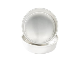Nordic Ware Naturals 9-inch round cake pan set for consistent baking and even browning.