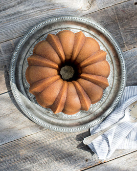 Nordic War Original Bundt 12-Cup silver nonstick release enables easy cake removal