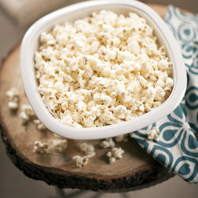 Nordic Ware popcorn popper lid view showing even popping and splatter prevention.