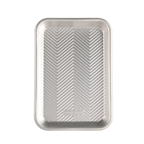 Nordic Ware Prism eighth sheet front view showing even browning with natural aluminum