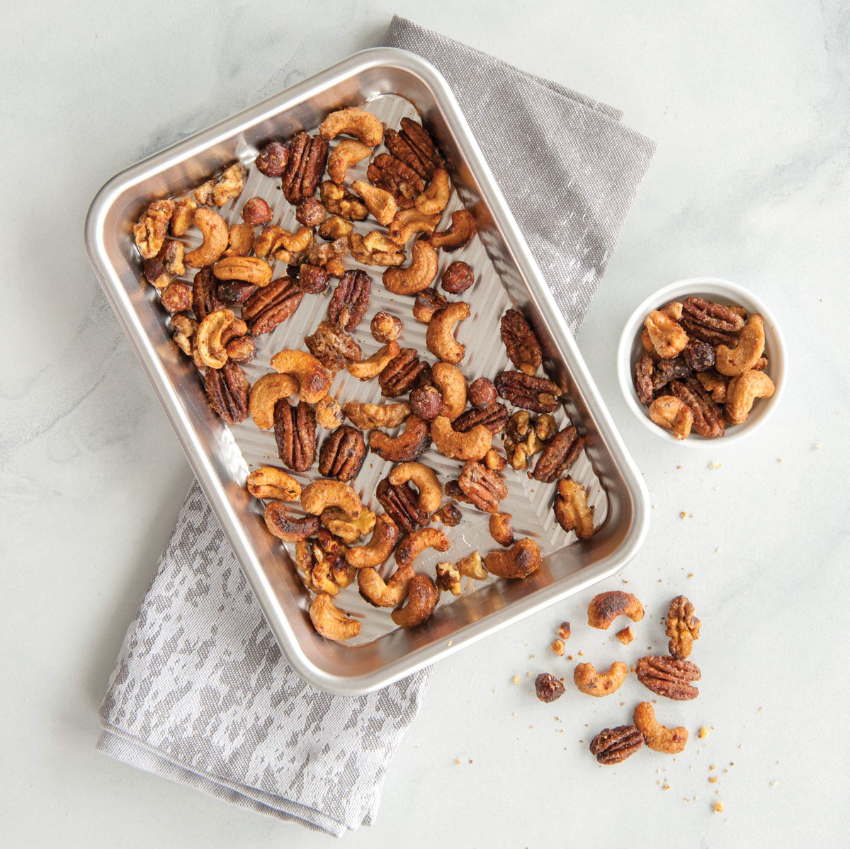 Nordic Ware Prism eighth sheet in use with cookies showing even bake