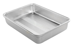Nordic Ware Prism baking pan 9x13 front view showing even browning and sturdy construction.
