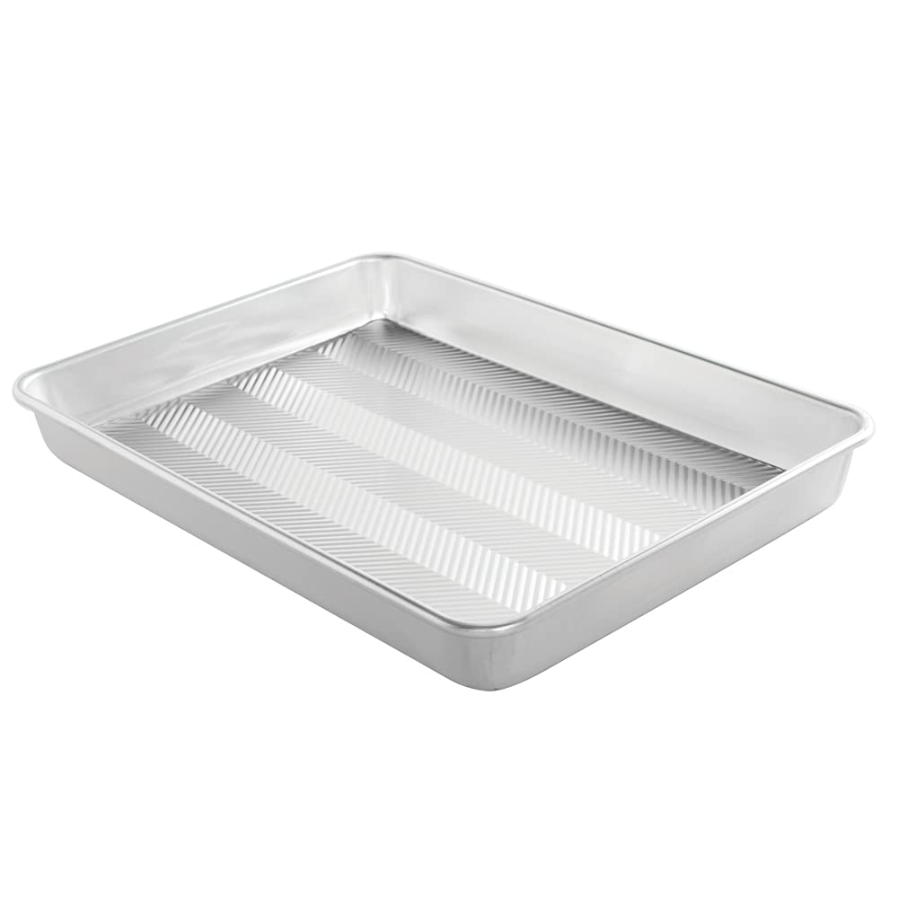 Nordic Ware Prism embossed grid enhances airflow for even baking and easy release.