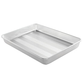 Nordic Ware Prism embossed grid enhances airflow for even baking and easy release.
