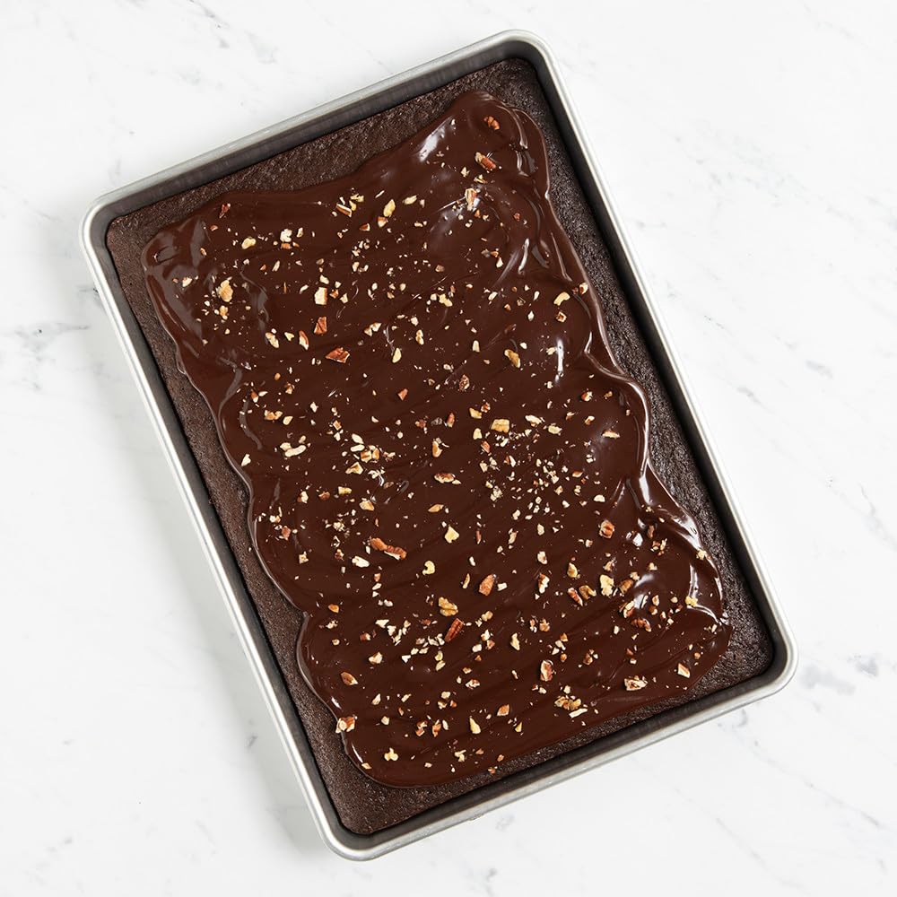 Nordic Ware Prism embossed aluminum for even heating and easy release.