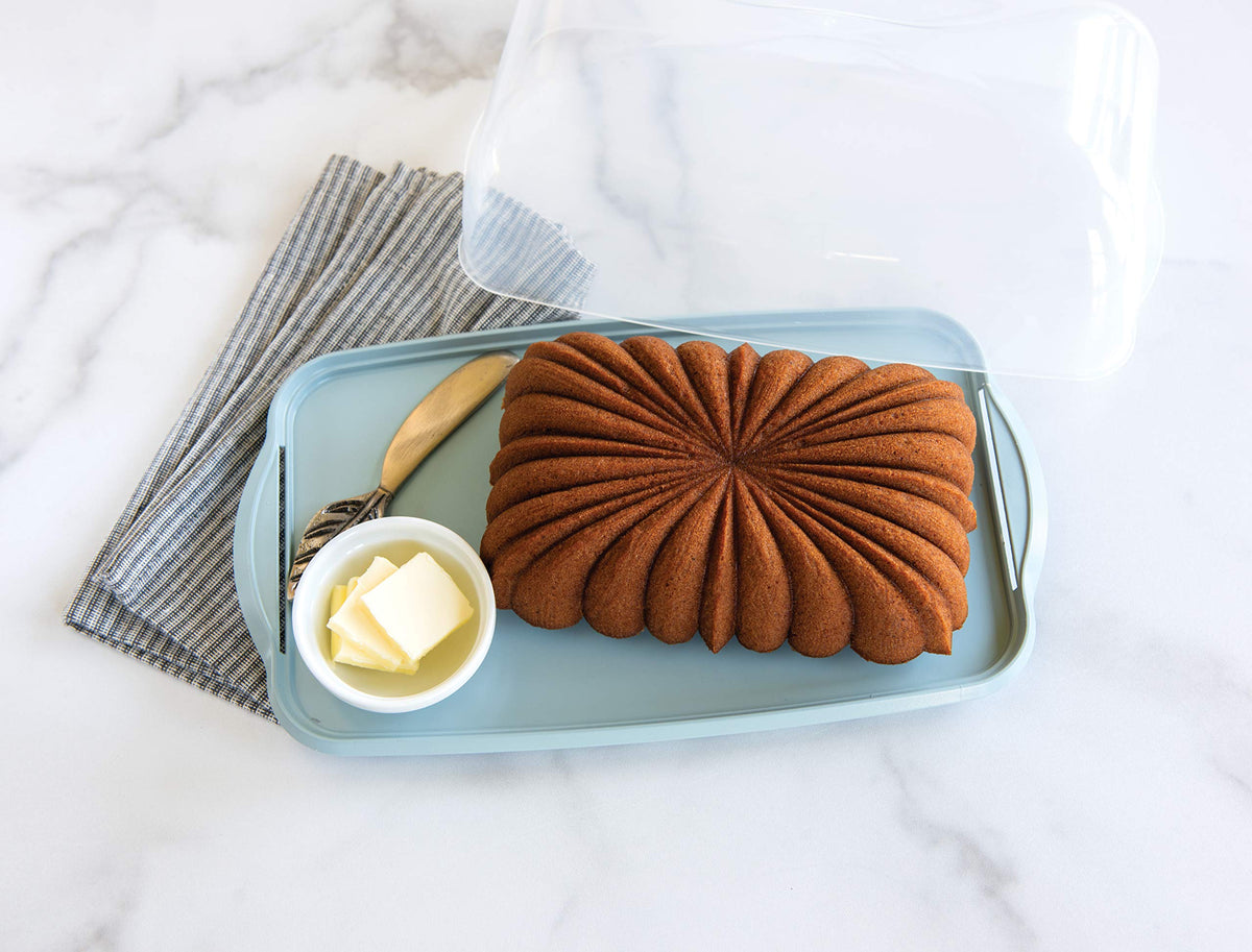 Nordic Ware serving base with scalloped edge doubles as a tray.