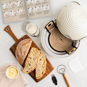 Nordic Ware Simply Sourdough glass starter jar with tracker band for monitoring starter readiness.