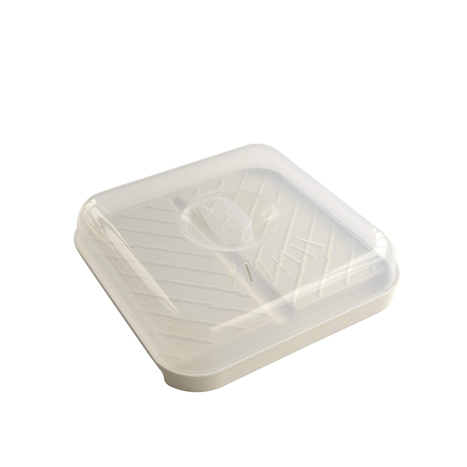 Nordic Ware slanted bacon tray with lid in white preserves a clean workspace and easy disposal.