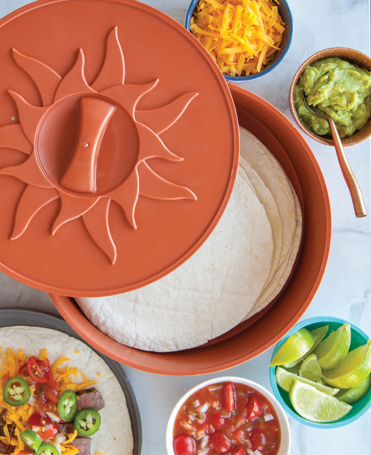 Nordic Ware tortilla warmer side view with lid; snug fit preserves moisture.