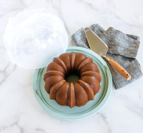 Nordic Ware Bundt Cake Keeper on countertop for easy display and access