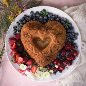 Nordic Ware Wildflower Heart Bundt Pan cast aluminum texture ensures crisp, even browning