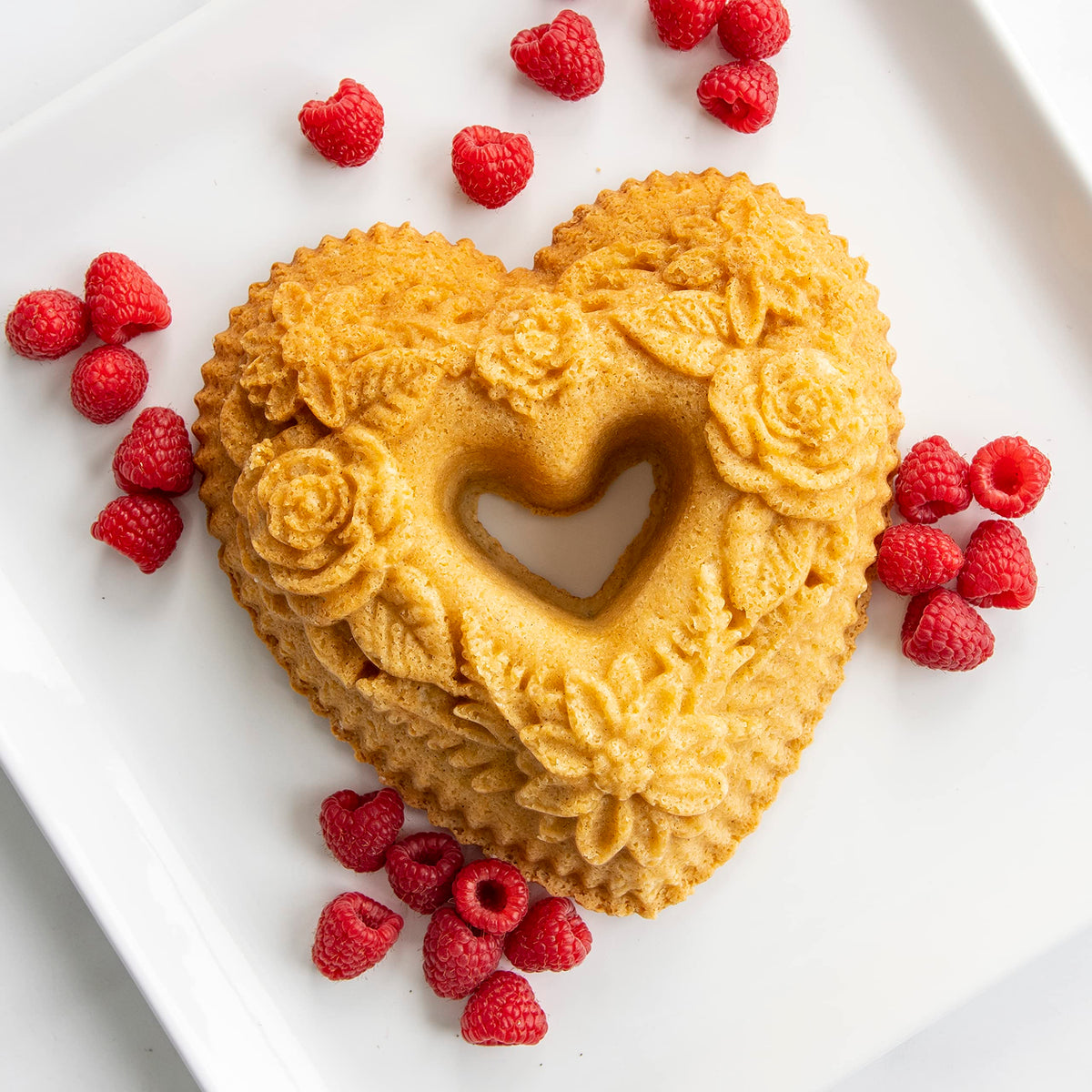 Nordic Ware Wildflower Heart Bundt Pan floral detail emphasizing intricate crust on cakes