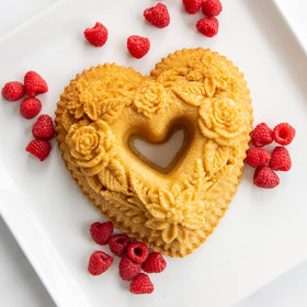 Nordic Ware Wildflower Heart Bundt Pan floral detail emphasizing intricate crust on cakes