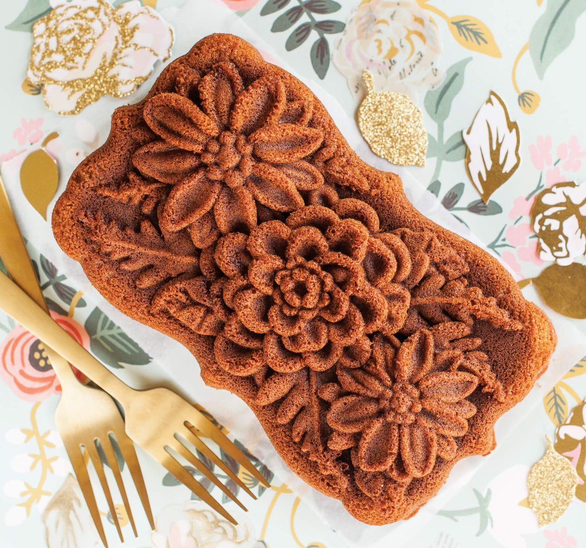 Nordic Ware Wildflower Loaf Pan flower top adds decorative loaf detail.