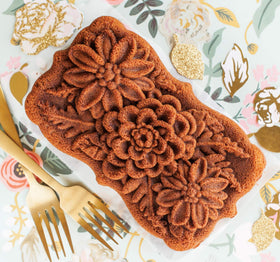 Nordic Ware Wildflower Loaf Pan flower top adds decorative loaf detail.