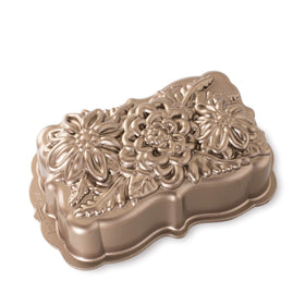 Nordic Ware Wildflower Loaf Pan toffee exterior shows durable craftsmanship for even baking.