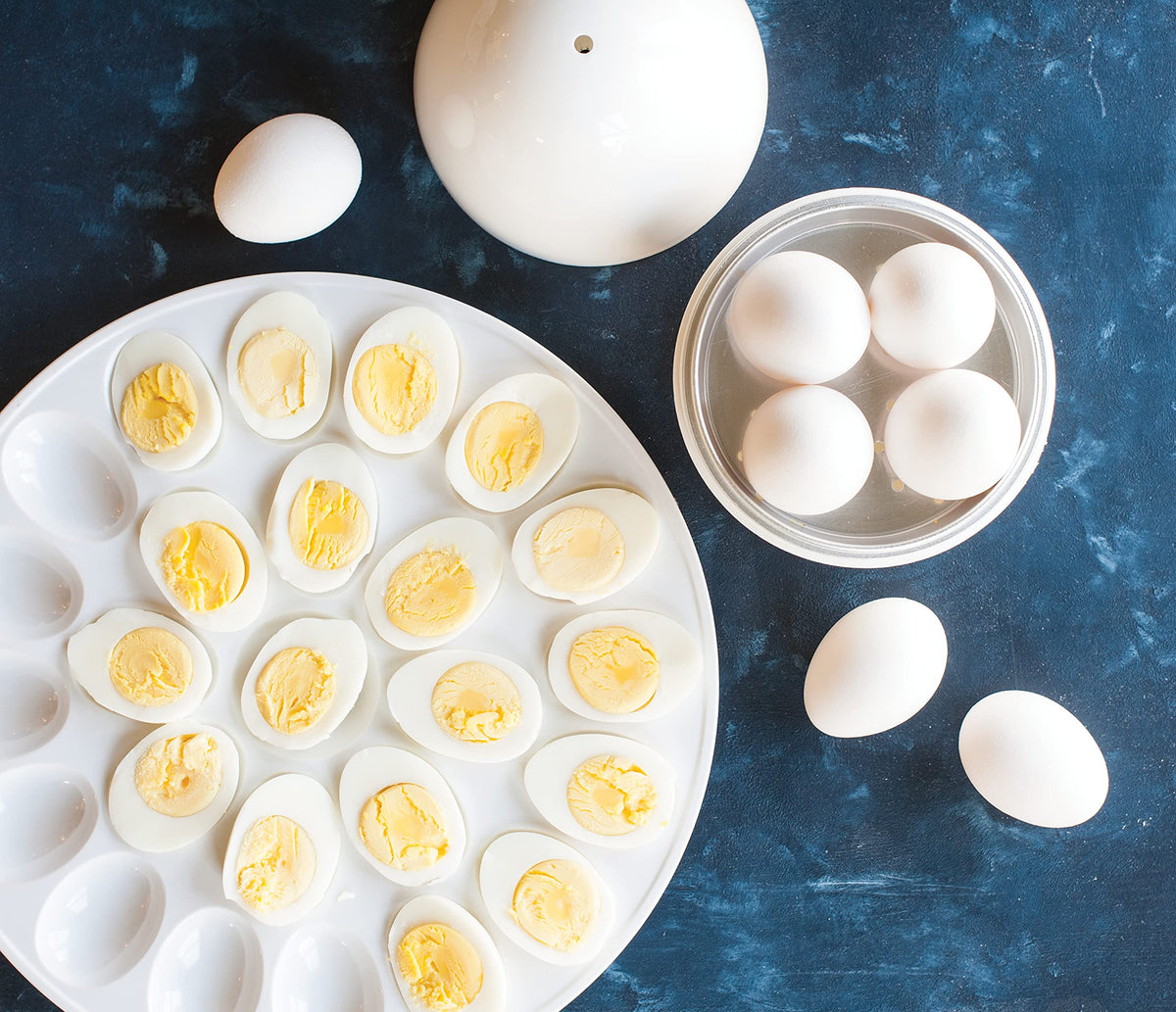 Nordic Ware microwave egg boiler eggs on perforated tray before cooking