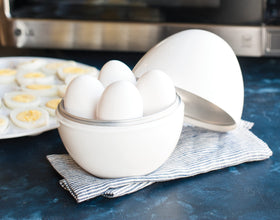 Nordic Ware microwave egg boiler interior shelf with eggs resting securely