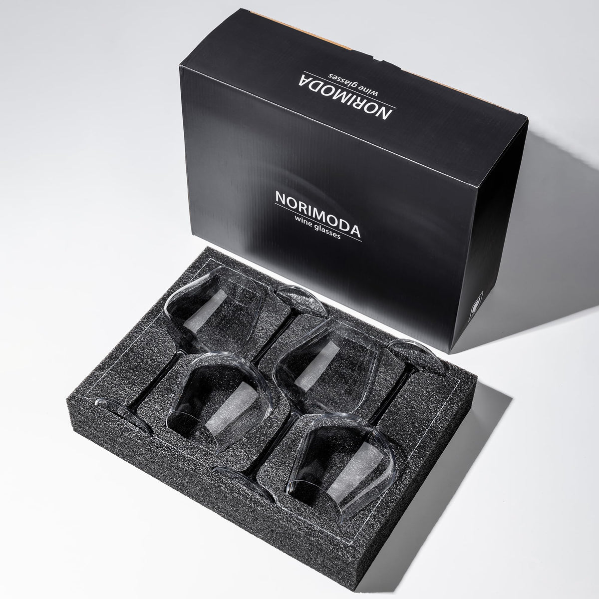 NORIMODA wine glasses stem-clarity for elegant table presentation.