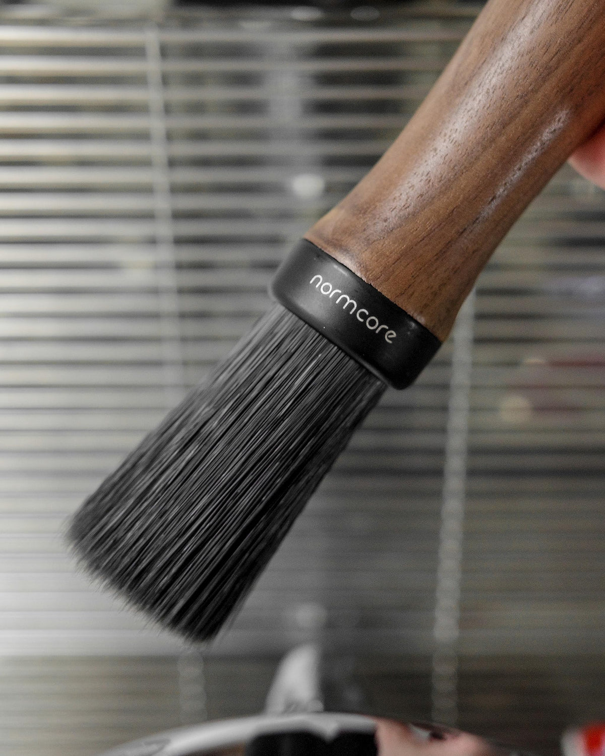Normcore Barista Brush with black oak handle for stylish, ergonomic use.