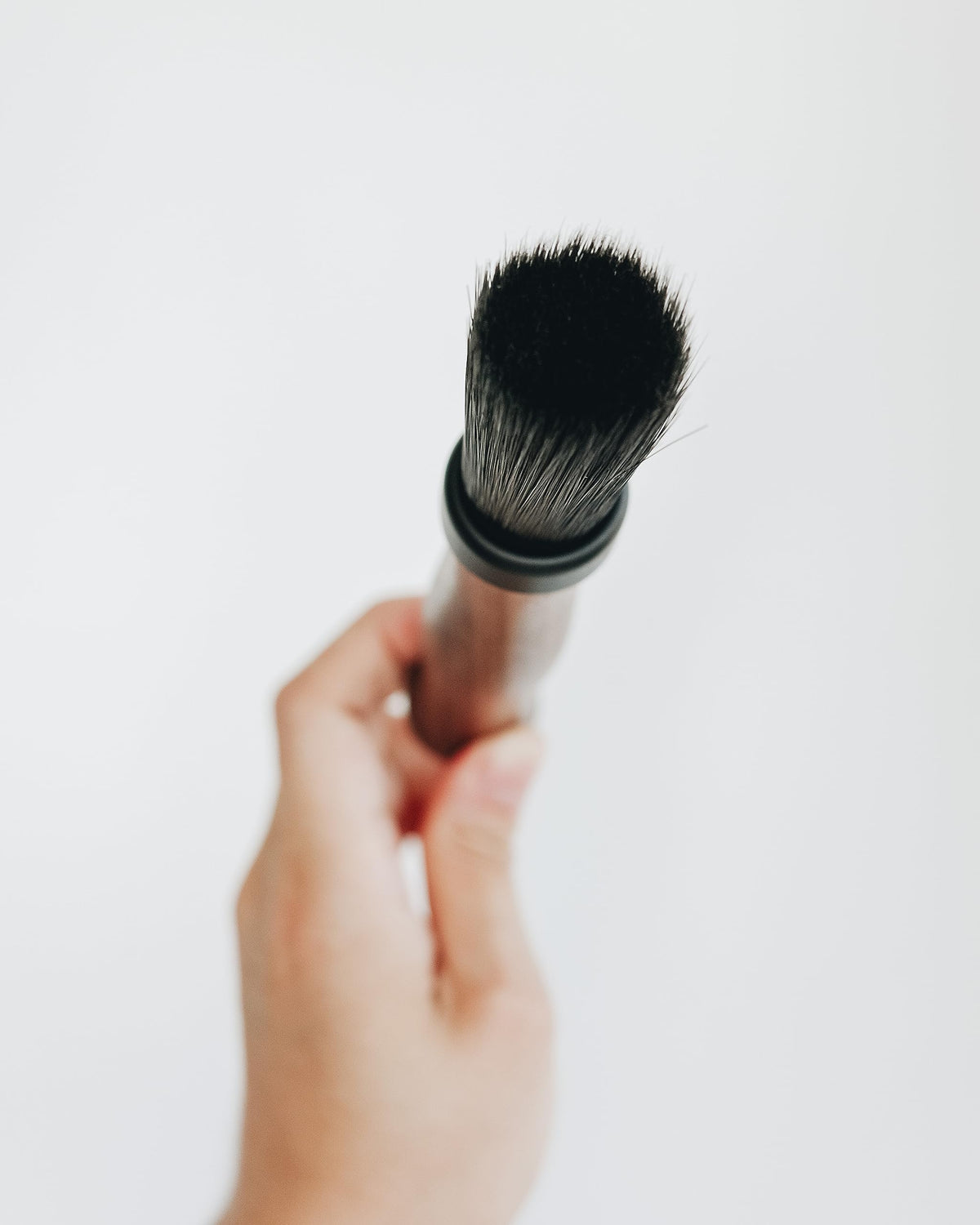Normcore Barista Brush stored in a drawer for quick cleanups.