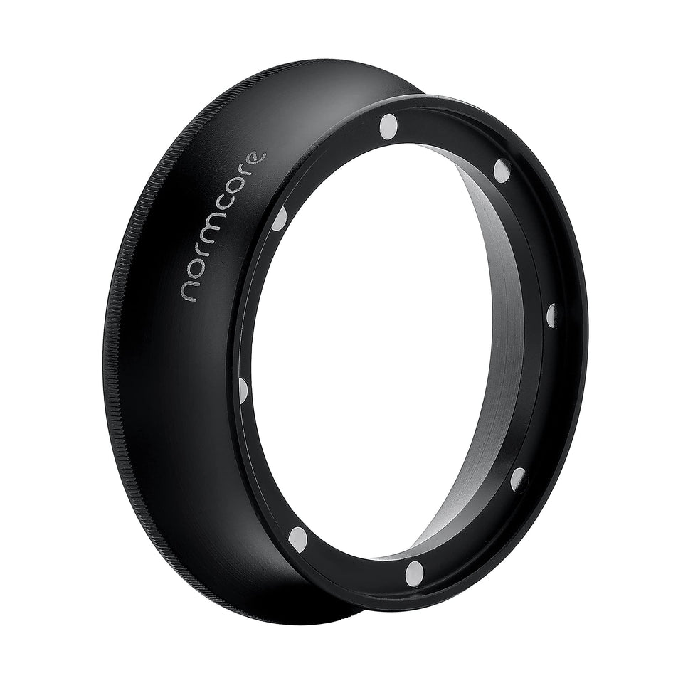 Normcore dosing funnel fits 54mm espresso ring on a portafilter for clean dosing.