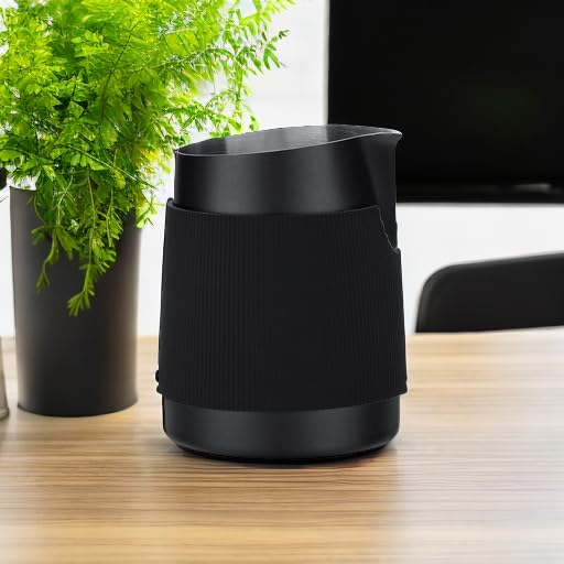 Normcore exposed metal base lets you test milk temperature while steaming.