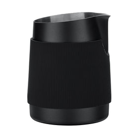 Normcore handleless milk frothing jug enables precise pours for latte art.