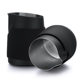 Normcore handleless milk pitcher with round spout delivers precise pours for latte art.