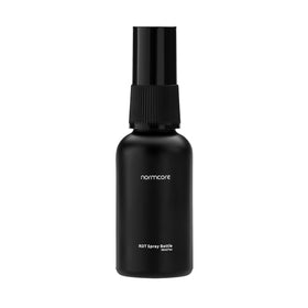 Normcore RDT spray bottle close-up, glass design aids precise static reduction during grinding