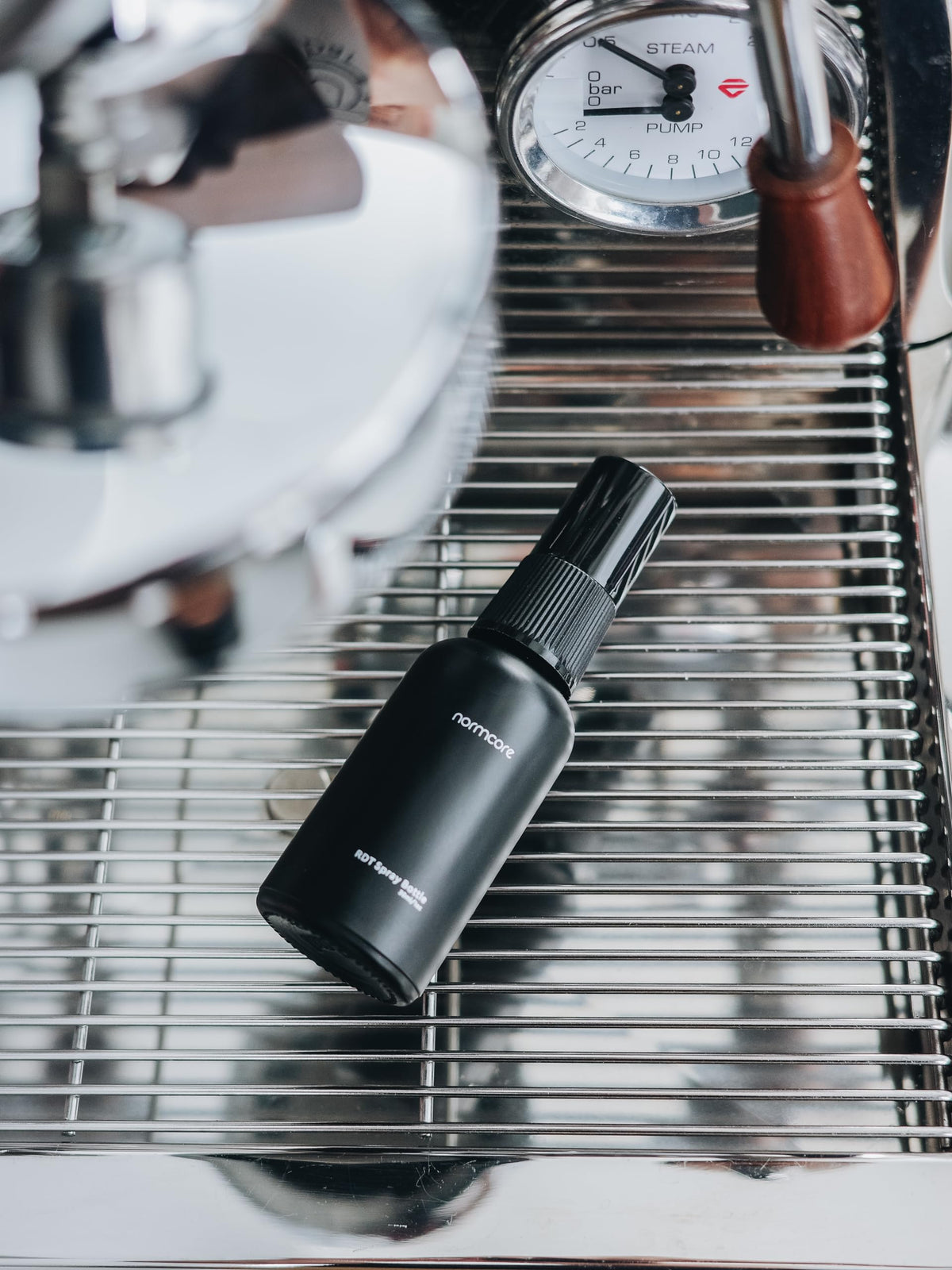 Normcore RDT spray bottle at grinder to minimize static during prep
