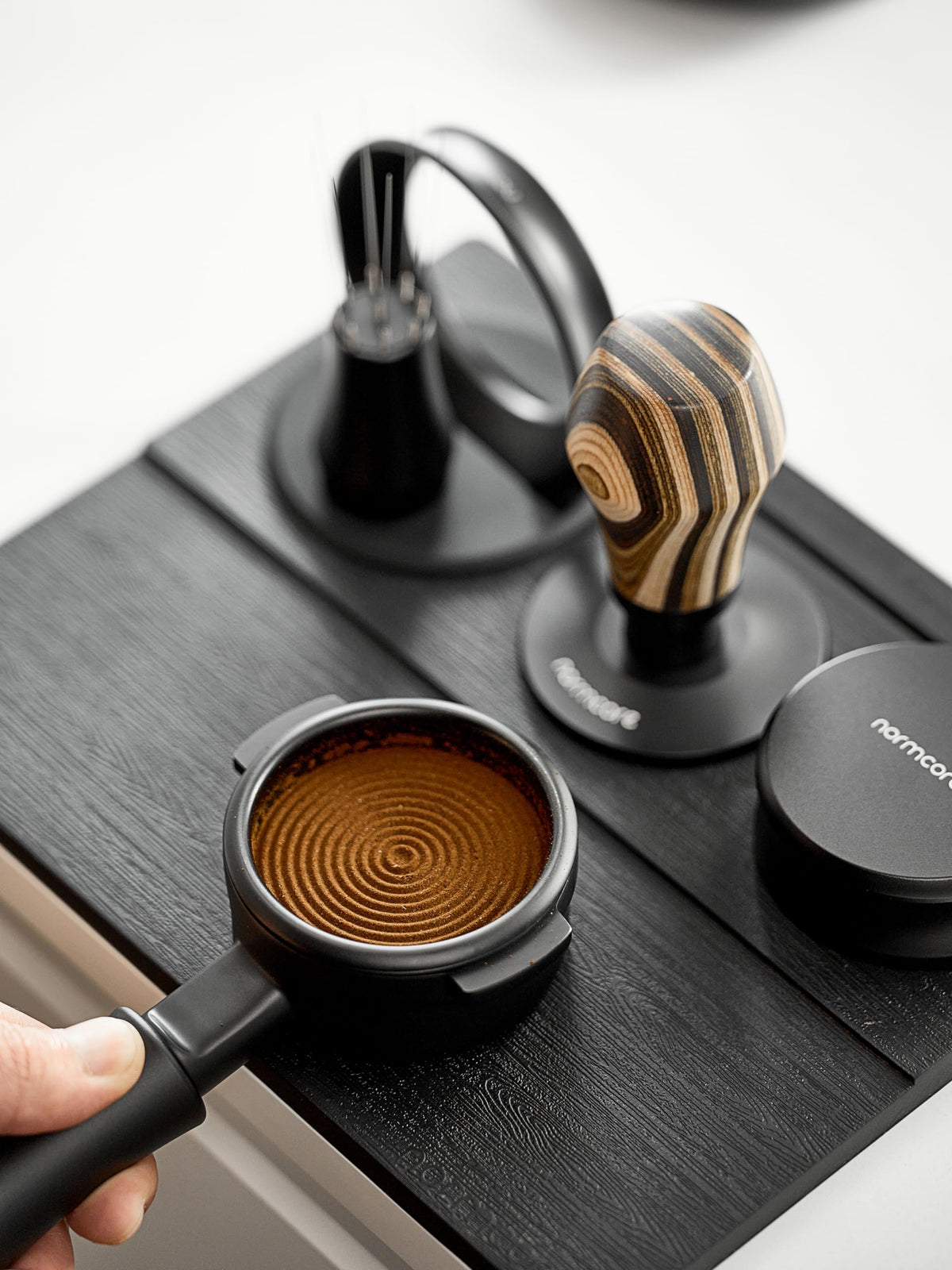 Normcore Tamping Mat anti-slip design keeps the portafilter steady during tamping.