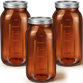 Norme amber half-gallon jar closeup showing sturdy glass and vintage charm for kitchen storage.