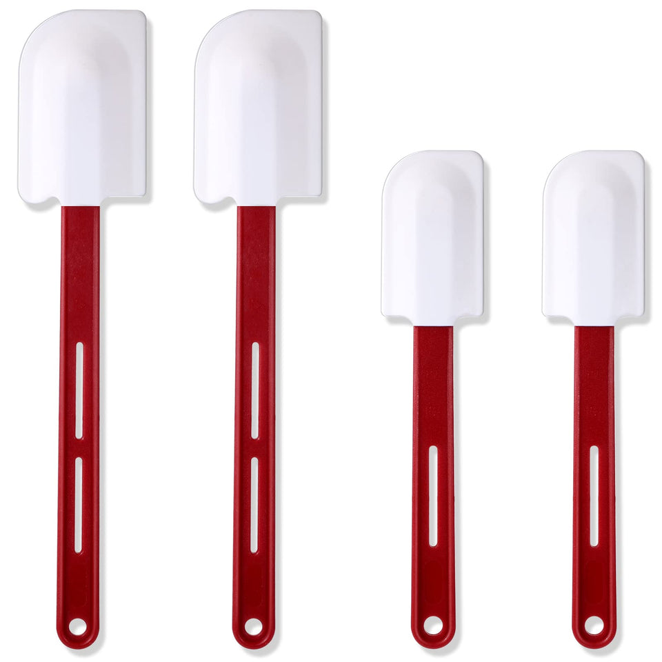 Norme four-piece silicone spatulas shown for nonstick pans with heat resistance up to 260°C.